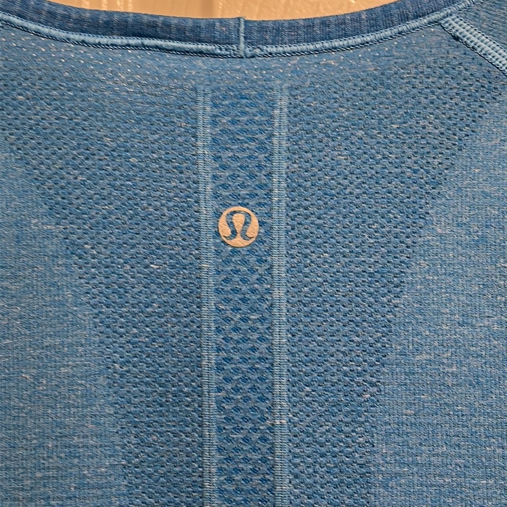 Lululemon Swiftly Tech V-neck short sleeve T-shirt. Color is a light blue. - Picture 4 of 5